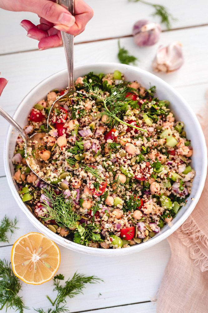 Quinoa Chickpea Salad is so easy to make. It's healthy and vegan. Serve as a summer side salad, or a light lunch or dinner. 